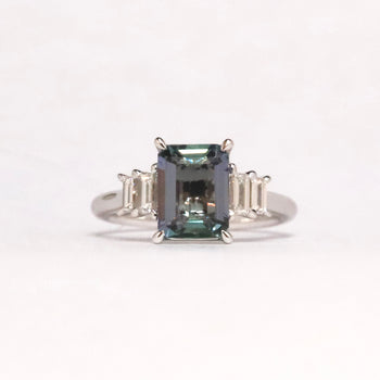 18ct White Gold Emerald Cut Unheated Tanzanite Ring with Baguette Diamond Sides