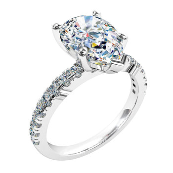 platinum or white gold pear diamond solitaire with side diamond engagement ring