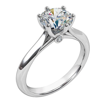 A platinum or white gold round brilliant cut diamond solitaire engagement ring melbourne