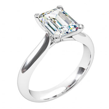 A platinum or white gold radiant cut diamond solitaire engagement ring