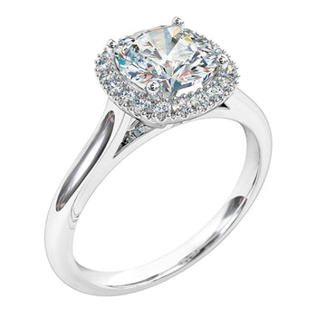 A platinum or white gold cushion cut diamond cluster halo solitaire engagement ring