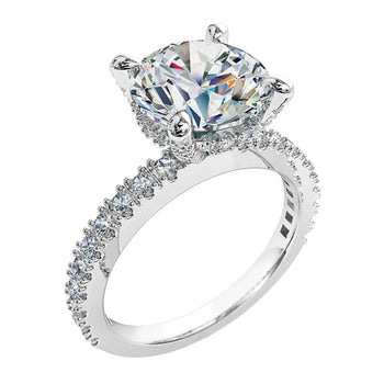 A platinum or white gold round brilliant cut diamond engagement ring melbourne with diamonds on the band and a hidden halo