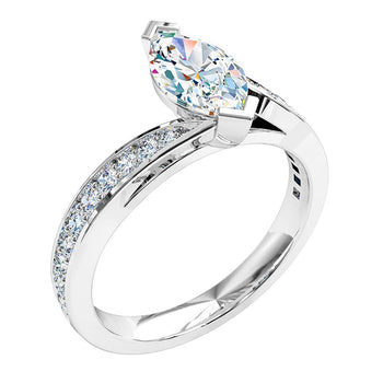 A platinum or white gold marquise cut diamond solitaire engagement ring featuring a grain set diamond band