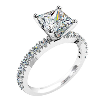 A platinum or white gold princess cut diamond solitaire with sides engagement ring