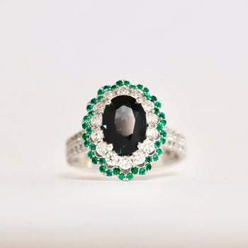 18ct White Gold Sapphire Ring with Diamond & Emerald Halo