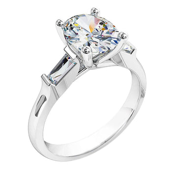 a white gold oval diamond trilogy solitaire engagement ring side view