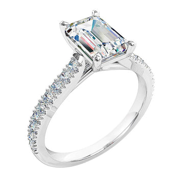 A platinum or white gold emerald cut diamond solitaire engagement ring with diamonds on the band 
