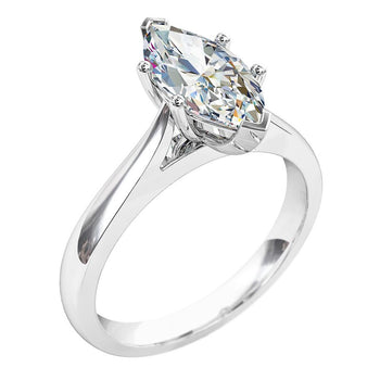 A platinum or white gold marquise cut diamond solitaire engagement ring 