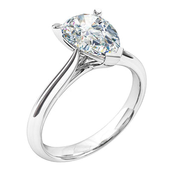 A platinum or white gold pear cut diamond solitaire engagement ring 