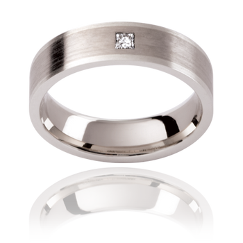A platinum or white gold mens diamond wedding ring featuring a princess cut diamond