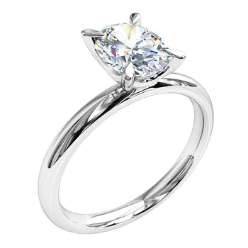 A platinum or white gold oval cut diamond solitaire engagement ring