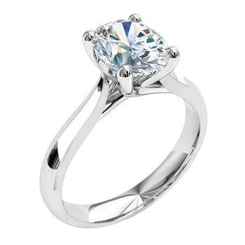 A platinum or white gold oval shaped diamond solitaire engagement ring