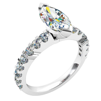 A platinum or white gold marquise cut diamond solitaire engagement ring with a shared claw diamond band