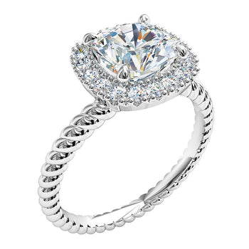 A platinum or white gold cushion cut diamond cluster halo engagement ring with a twist solitaire band