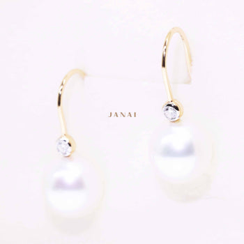 A pair of south sea pearl diamond earrings