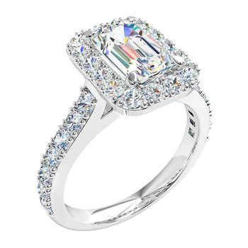 A platinum or white gold emerald cut diamond halo engagement ring with a individual claw set diamond band
