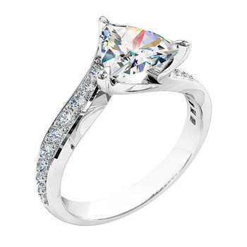 A platinum or white gold trilliant cut diamond solitaire engagement ring with diamonds on the band