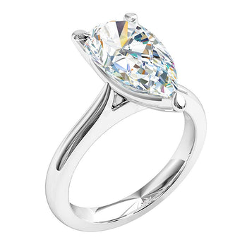 A platinum or white gold pear-shaped diamond solitaire engagement ring