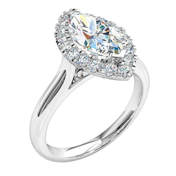 A platinum or white gold marquise brilliant cut diamond halo solitaire engagement ring