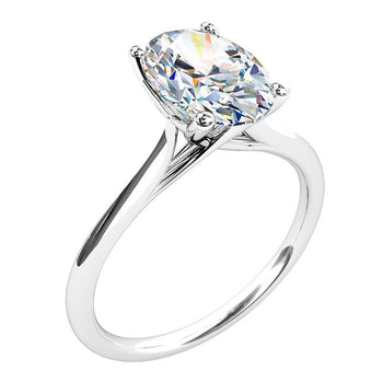 A platinum or white gold oval diamond solitaire engagement ring
